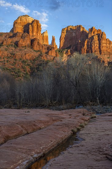 Cathedral Rock sandstone formations tower over Oak Creek at the Crescent Moon Picnic Site in