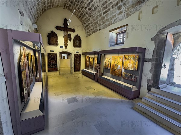 Entrance area with showcases historical icons in museum Monastery museum in UNESCO World Heritage