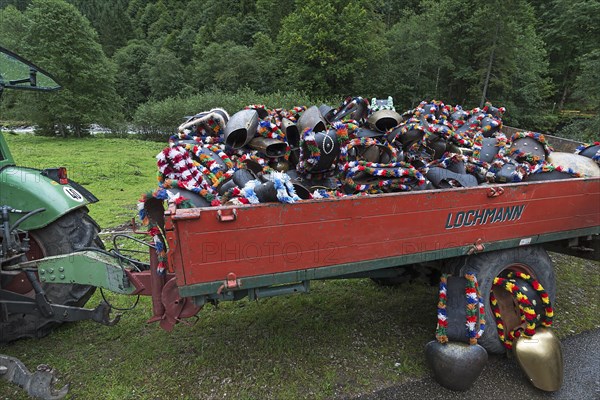 Jewellery cowbells for the cattle drive on a hanger, gabled house, Bad Hindelang, Allgaeu, Bavaria,