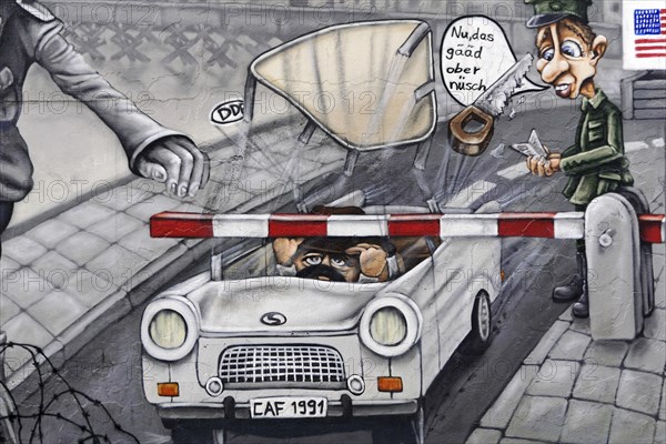 Detailed mural shows a caricature of soldiers at a checkpoint, car with humorous elements, mural,