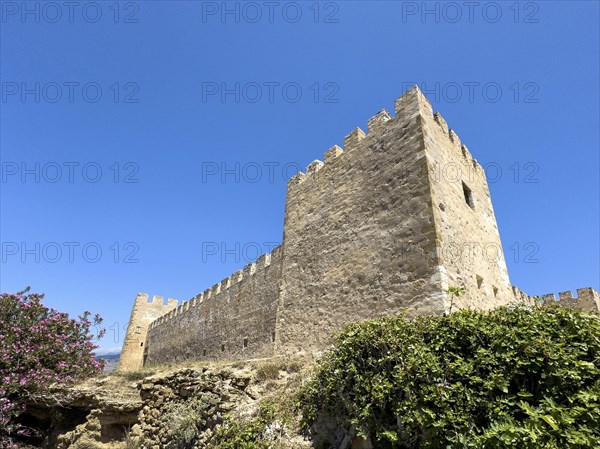Exterior view with two corner towers walls battlements of Fort Fortezza Fortetza Frangokastello