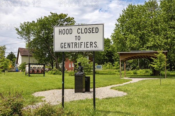 Detroit, Michigan, An anti-gentrification sign posted in the East Canfield Art Park in the East