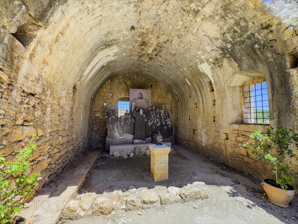 View of monument to sacrifice among monks residents of Arkadi Monastery in former wine cellar later
