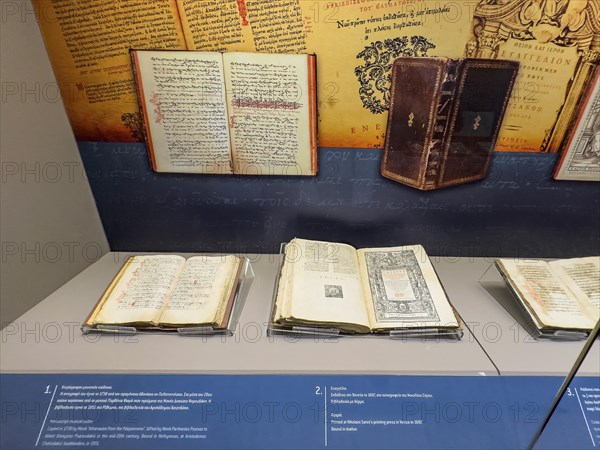 Showcase in museum Monastery museum with antique books partly from historical former copying