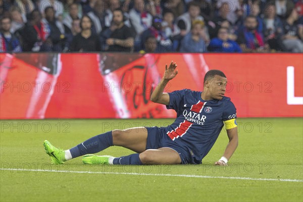 Football match, captain Kylian MBAPPE' Paris St Germain has just been fouled and is lying on the