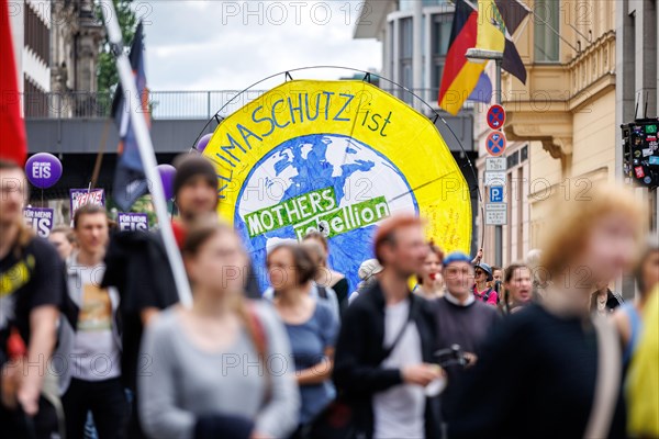 Demonstrators with signs at Fridays for Future, taken during the climate strike for the EU