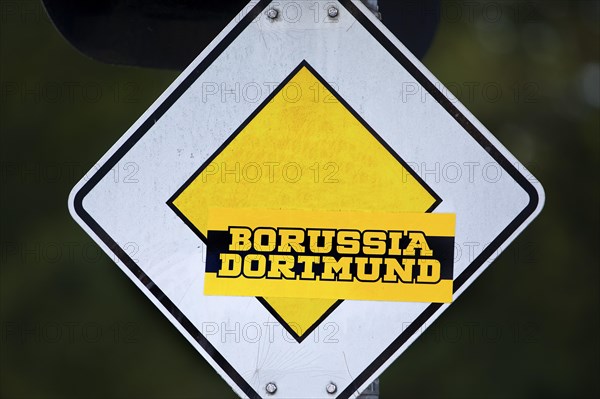 Right of way sign with Borussia Dortmund sticker, symbol photo right of way BVB, Dortmund, Ruhr