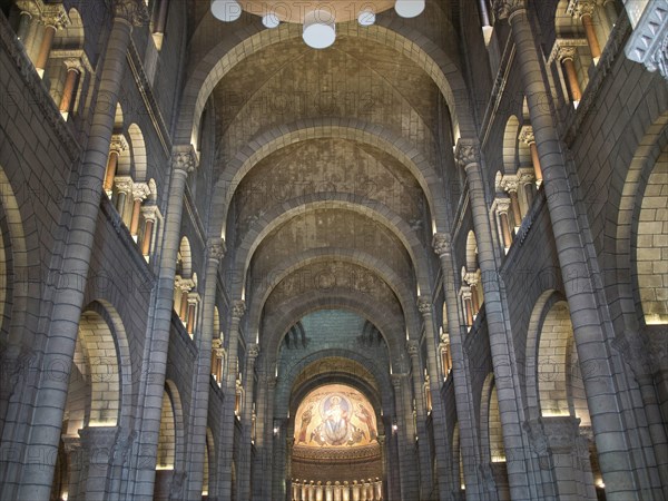 Impressive church interior with stone arches, vaults and ceiling mosaic, Monte Carlo, Monaco,