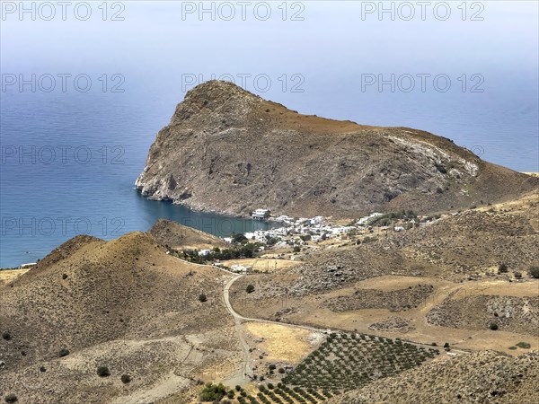 View from elevated position on small village Lentas Lendas at the foot of Asterousia Mountains next