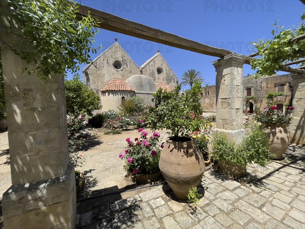 View of rear wall of double-aisled church building Church of Arkadi Monastery with double apse in