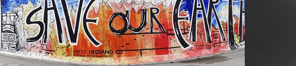 Graffiti on the Berlin Wall at the East Side Gallery, Berlin, Germany, Europe, A colourful graffiti