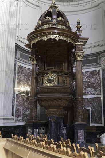 Interior view of Berlin Cathedral, Berlin, Germany, Europe, Richly decorated wooden pulpit in a