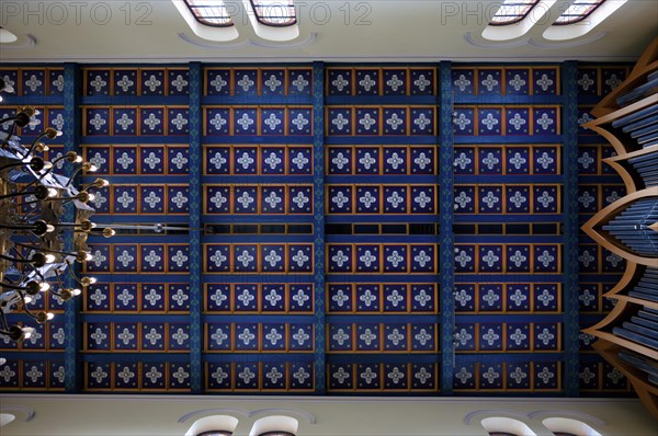 Interior view of wooden coffered ceiling with dark blue painted beams, St. Marien am Behnitz,