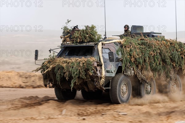German soldiers on a Fuchs armoured transport vehicle, taken during the NATO Steadfast Defender