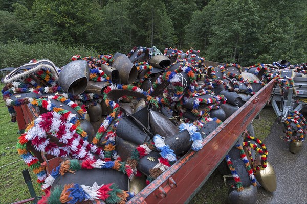 Jewellery cowbells for the cattle drive on a hanger, gabled house, Bad Hindelang, Allgaeu, Bavaria,