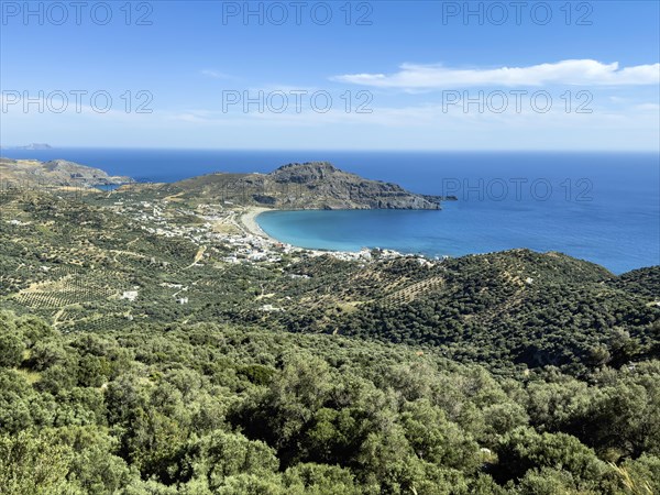 View from elevated position on landscape at south coast of island Crete over in the foreground many