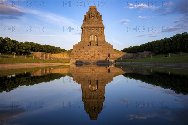 Monument to the Battle of the Nations, reflection in the lake, evening mood, Leipzig, Saxony,