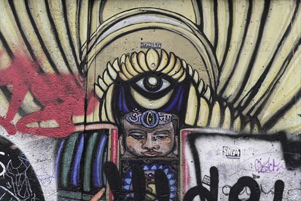 Graffiti on the Berlin Wall in the East Side Gallery, Berlin, Germany, Europe, Surrealist graffiti