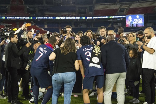 Football match, MBAPPE' family seen from behind from left to right: Captain Kylian MBAPPE' Paris St