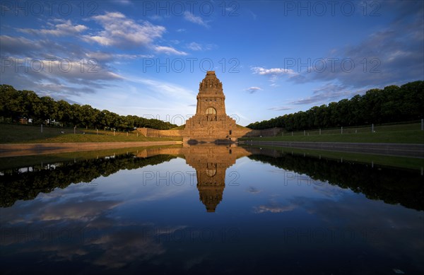 Monument to the Battle of the Nations, reflection in the lake, evening mood, Leipzig, Saxony,