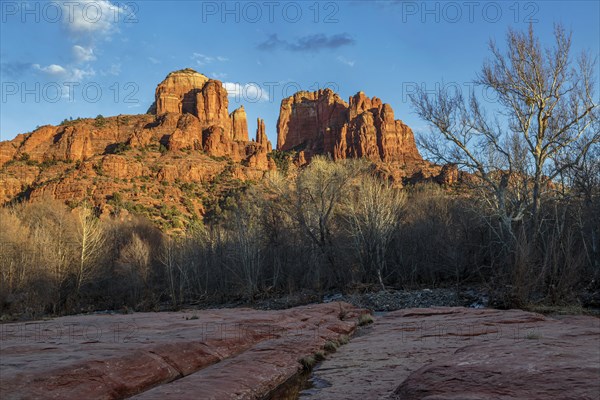 Cathedral Rock sandstone formations tower over Oak Creek at the Crescent Moon Picnic Site in