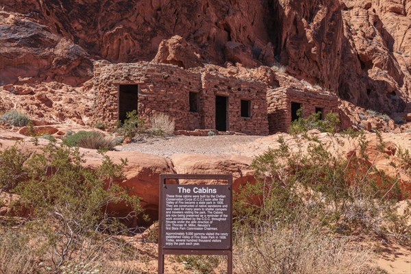 Sign tells the history of The Cabins built by the Civilian Conservation Corps in the 1930s at