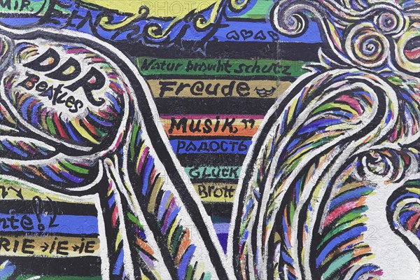 Graffiti on the Berlin Wall in the East Side Gallery, Berlin, Germany, Europe, Colourful graffiti