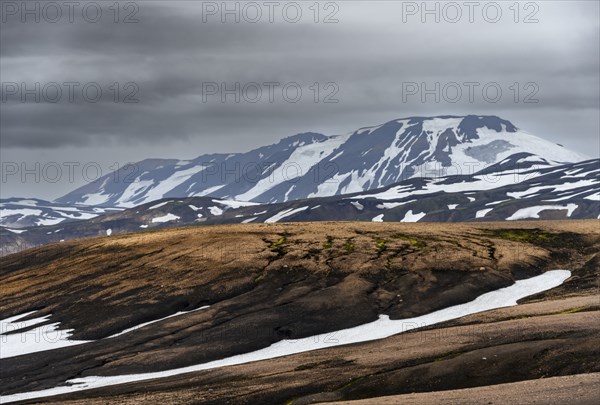 Volcanic landscape with hills and snow, Laugavegur trekking trail, Landmannalaugar, Fjallabak