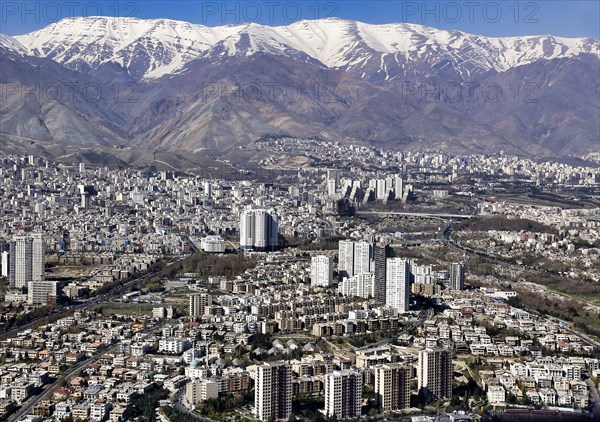 View of the metropolis of Tehran with snow-capped mountains in the background, 25/03/2013, Tehran,