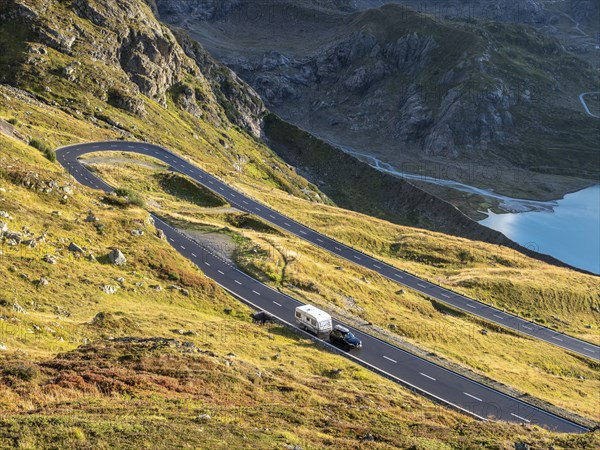 Car with caravan, Sustenpass, swiss mountain pass, Switzerland, Europe