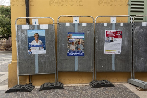 Election posters with local politicians, early elections in France 2024, Frejus, Côte d'azur,