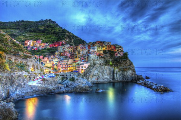 Manarola at sunset, Cinque Terre, Italy, Europe