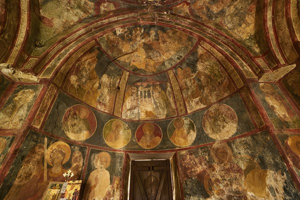 A frescoed church interior showing circular portraits and religious art, Byzantine Chapel of Agios
