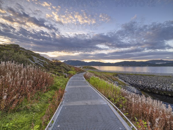 Circular route along the Atlantic Road, blue sky with clouds, sunrise, Atlanterhavsveien, More og