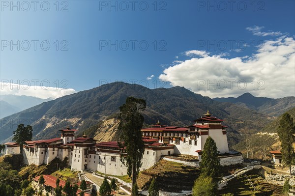 View of the Trongsa Dzong on a sunny day with blue sky