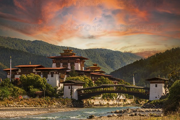 Punakha Dzong at sunset with the Mo Chhu river in Bhutan