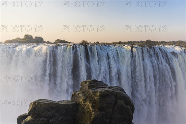 Close-up of the mighty Victoria Falls waterfall in Matabeleland on a late afternoon