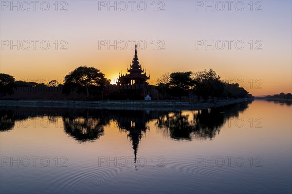 Pagoda silhouette during a sunset in Mandalay, Myanmar (Burma)