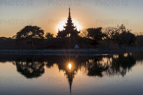 Pagoda silhouette during a sunset in Mandalay, Myanmar (Burma)