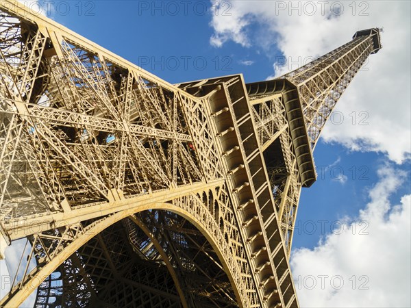 Wide angle shot of Eiffel from one of the pillars
