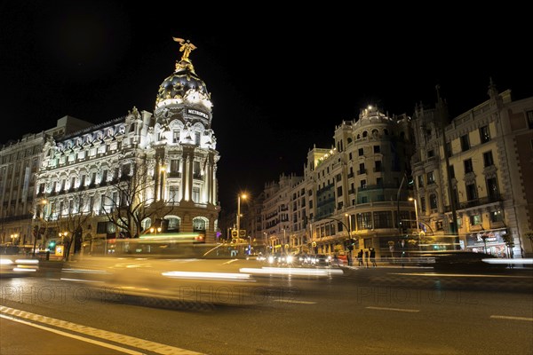 Alcala and Gran Via street in Madrid night city lights