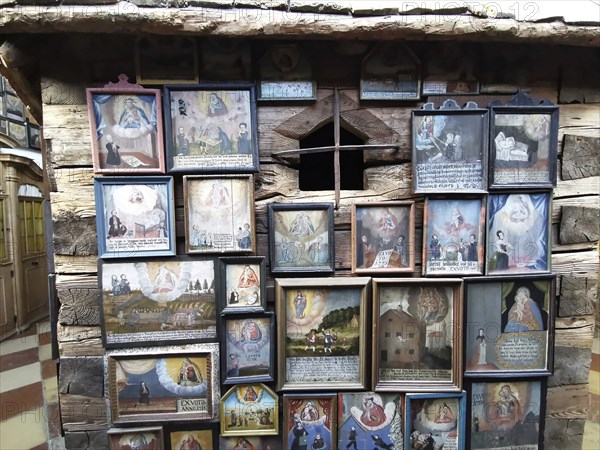 Votive pictures, votive tablets on the walls of the chapel of grace inside the church, pilgrimage