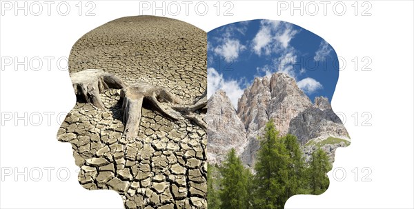 Silhouette of two faces look to the opposite direction, one with green nature, mountains, the other