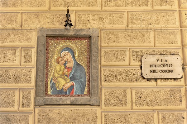 Montepulciano, Tuscany, Italy, Europe, Mural of the Madonna and Child, on a stone wall in a