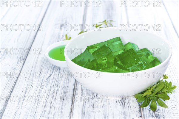 Fresh made Woodruff Jello (close-up shot) on wooden background