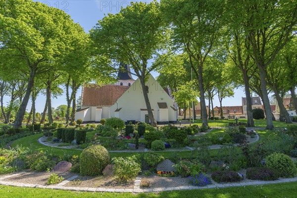 Bogense on the Kattegat, St Nicolas Church, Danish architecture, group of trees, graves,