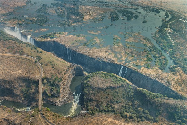 Victoria Falls at drought near Livingstone, Zimbabwe, as aerial shot made from a helicopter, Africa