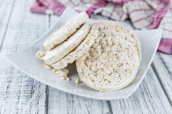 Some Rice Cakes (close-up shot) on an old wooden table