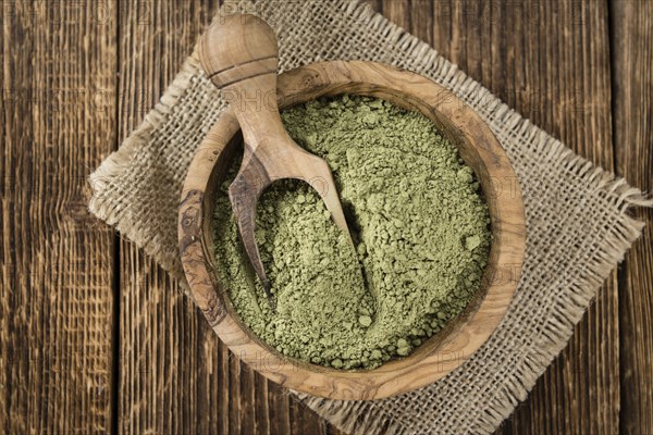 Stevia Powder on an old wooden table (close-up shot)