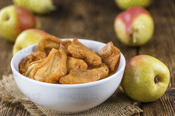 Bowl with dried Pears (close-up shot, selective focus)